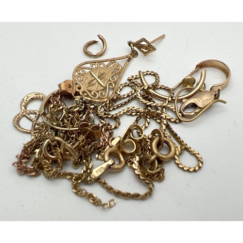 1026 - A small quantity of mixed 9ct gold jewellery suitable for scrap. To include broken chains and single... 