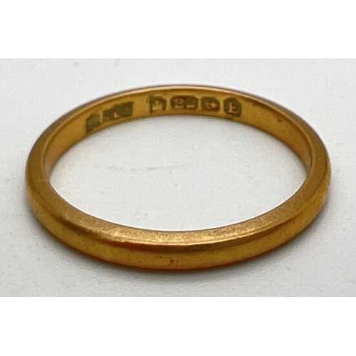 1030 - A vintage 22ct gold 2mm wedding band. Full hallmarks to inside of band. Size H½. Total weight approx... 