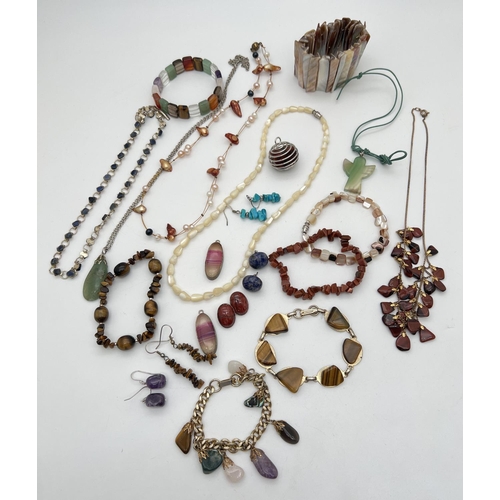 1056 - A collection of natural stone and shell jewellery. To include earrings, pendants, necklaces and brac... 