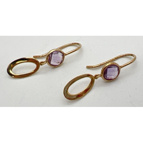 1077 - A pair of 9ct gold modern design drop earrings each set with a chequer board cut amethyst stone. Mar... 