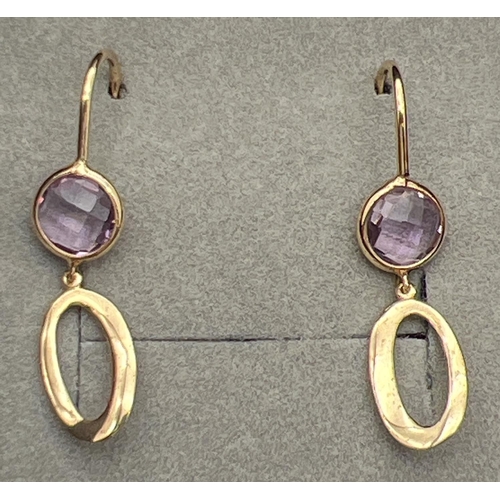 1077 - A pair of 9ct gold modern design drop earrings each set with a chequer board cut amethyst stone. Mar... 