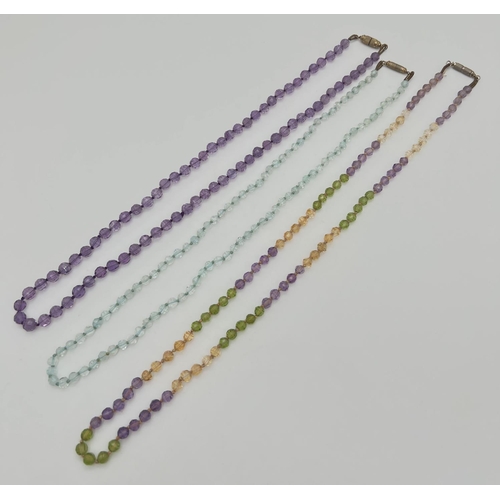 1078 - 3 faceted gem stone beaded necklaces with screw barrel clasps. A 20 inch pale aquamarine necklace, a... 