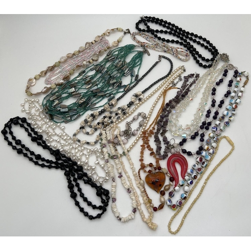 1079 - A collection of vintage and modern, natural stone, pearl, glass bead and shell necklaces. To include... 