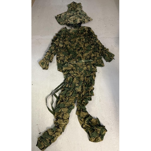 1235 - A 3 piece military woodland camouflage Ghillie suit. Comprising helmet and head cover, jacket/top an... 