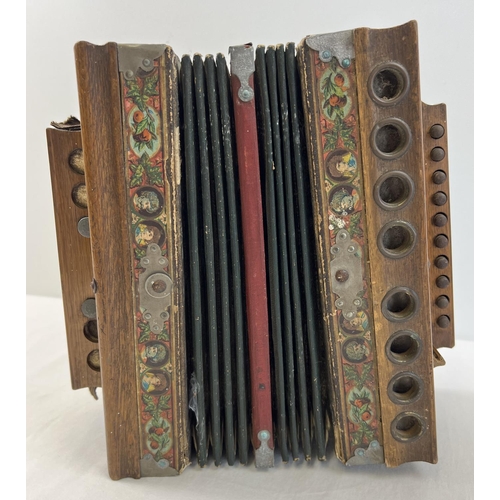 1341 - An antique Imperial Accordion by J.F. Kalbe. In need of attention/restoration. Deep maroon and gold ... 