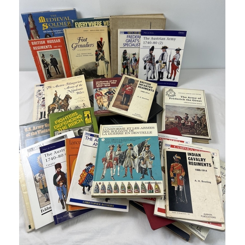 1238 - A large collection of military and military uniform books. To include U.S. Army Uniforms of the Viet... 