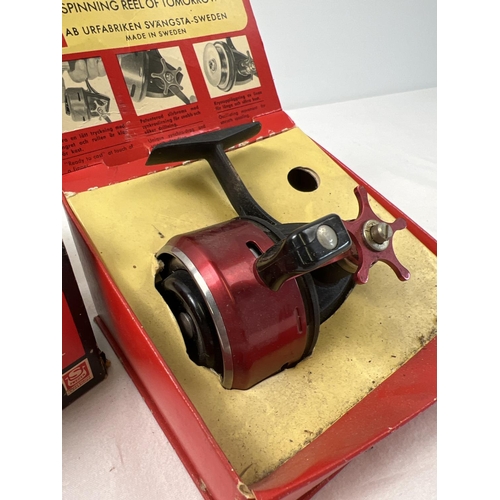 1396 - A boxed vintage Swedish ABU-505 closed face fishing reel in red chrome and black finish. Donated to ... 