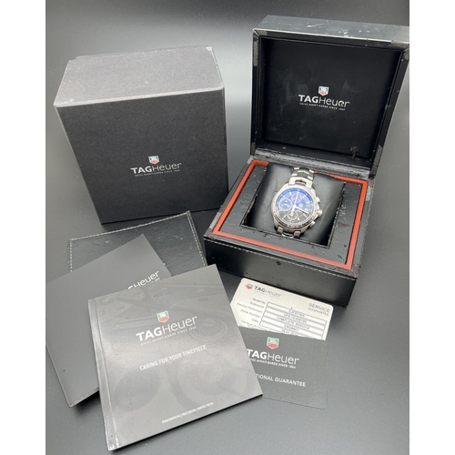 1147 - A boxed Link automatic chronograph Tachymeter wristwatch (EBQ8801) by Tag Heuer. Stainless steel str... 