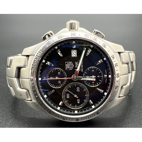 1147 - A boxed Link automatic chronograph Tachymeter wristwatch (EBQ8801) by Tag Heuer. Stainless steel str... 