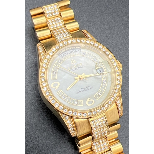 1135 - A ladies modern automatic wristwatch by Lobor Collection. Gold tone stainless steel strap and case s... 