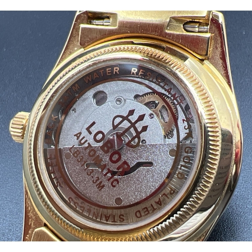 1135 - A ladies modern automatic wristwatch by Lobor Collection. Gold tone stainless steel strap and case s... 