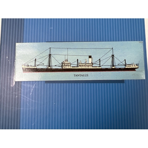 1253 - An album containing 98 vintage mostly black & white postcards & photographs of ships to include The ... 