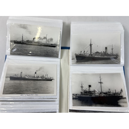 1253 - An album containing 98 vintage mostly black & white postcards & photographs of ships to include The ... 