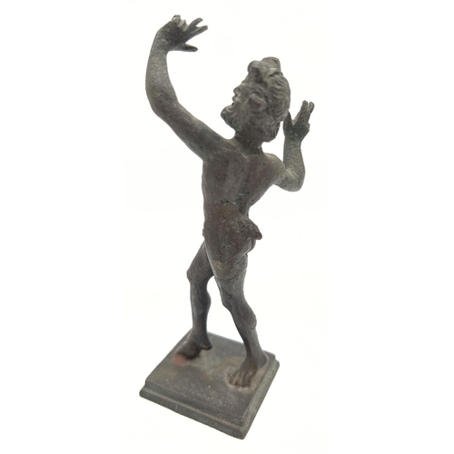 1187 - A bronze coloured metal figurine of The Dancing Fawn Of Pompeii. Approx. 14cm tall.