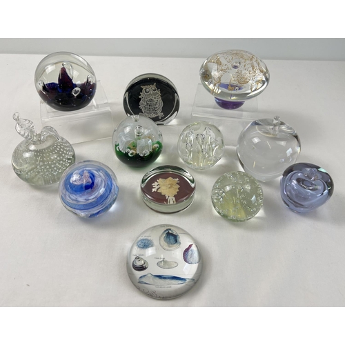 1296 - A collection of assorted glass paperweights to include coloured & clear glass and weights shaped as ... 