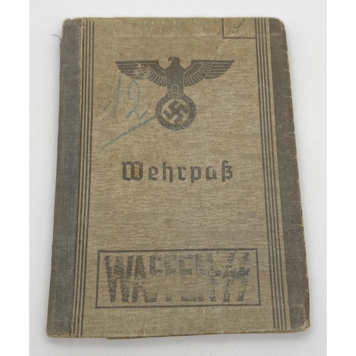 1217 - A world war II German Wehrpass military registration book for Bernhard Lemar. With identity photo to... 