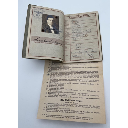 1217 - A world war II German Wehrpass military registration book for Bernhard Lemar. With identity photo to... 