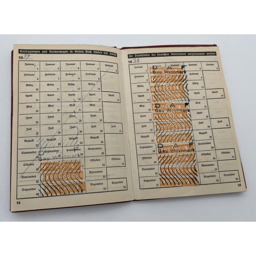 1219 - A World war II style DAF (German Labour Front) membership book for Josef Schmitt. Stamps and handwri... 