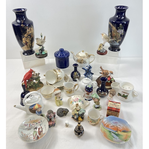 1260 - A box of assorted vintage and modern ceramics to include Noritake and Delft. Lot includes a collecti... 