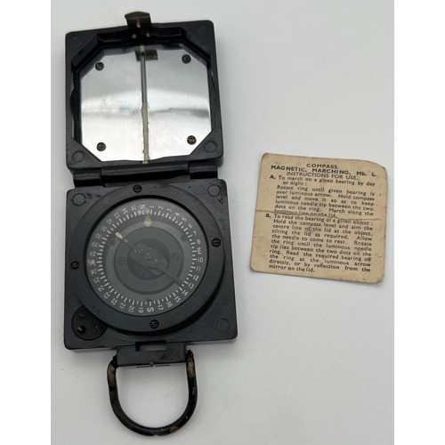 1221 - A Military Magnetic Marching Mk. 1 compass by T.G.Co, Ltd, Complete with instruction paper. Approx. ... 