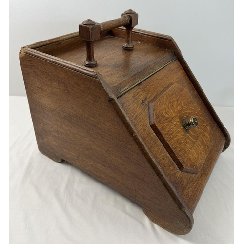 1498 - A vintage dark wood coal scuttle/box with turned wooden handle and lift up lid. Liner and scoop miss... 