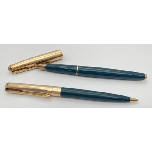 1178 - A vintage Parker fountain pen & mechanical pencil set with 12ct Rolled Gold caps. Teal coloured body... 