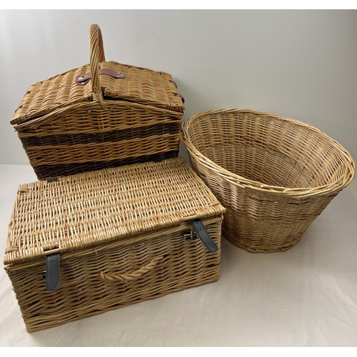 1418 - 3 wicker items. A lined picnic basket with carry handle containing cutlery and cruet set, an oval wa... 