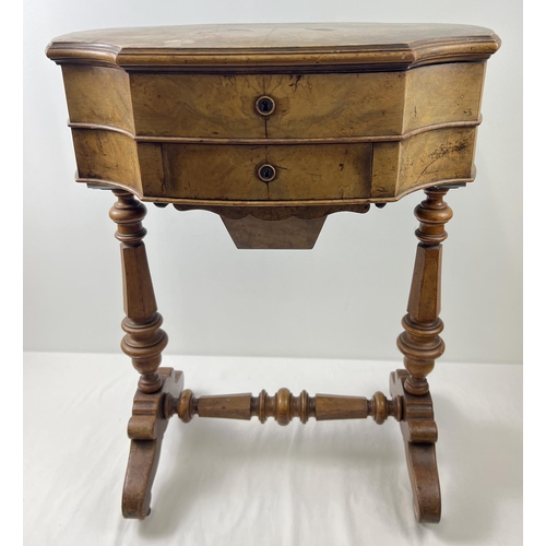 1499 - A Victorian walnut veneer sewing box on shaped and turned legs with ceramic castors. Lift up lid wit... 