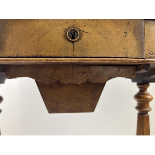 1499 - A Victorian walnut veneer sewing box on shaped and turned legs with ceramic castors. Lift up lid wit... 