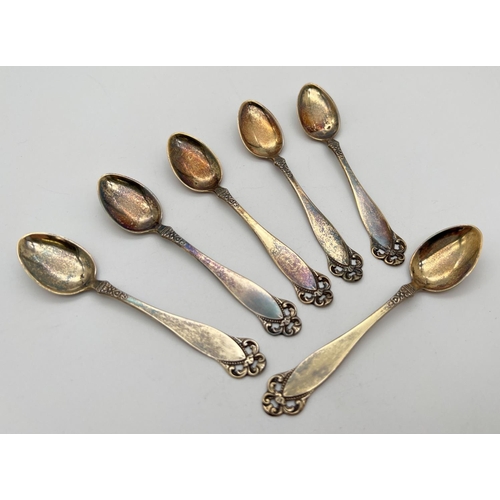 1155 - A set of 6 continental silver gilt coffee spoons, each stamped to reverse of handle '830S & NM'. Wit... 