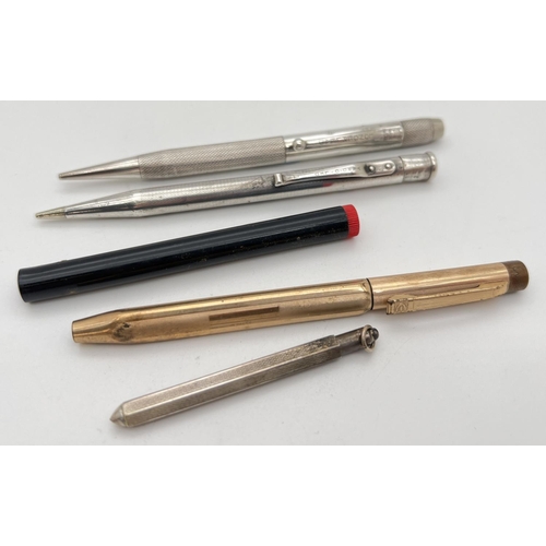 1183 - 2 vintage silver cased propelling pencils together with a rolled gold pencil, a small white metal po... 