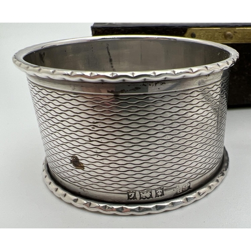 1158 - 3 vintage hallmarked silver items to include boxed napkin ring with engraved detail, hallmarked B'ha... 