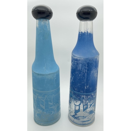 1299 - Two 1970's Salvador Dali for Rosso Antico aperitif bottles in blue tones, with serigraphic image. We... 