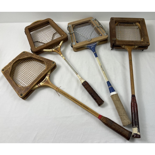 1399 - 4 vintage badminton rackets with original stretchers to include Dunlop, FairPlay and Slazenger.