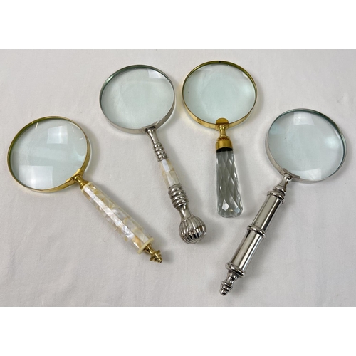 1421 - 4 large magnifying glasses to include faceted glass handled, brass handled set with pearl, and silve... 