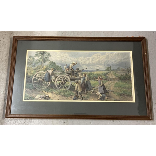 1474 - A large framed and glazed print of Victorian children playing on a hay cart. Frame size approx. 56.5... 