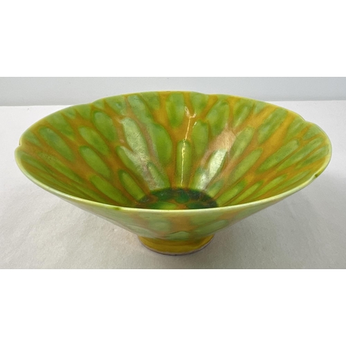 1317 - A Chinese ceramic bowl with yellow and green spotted design glaze and scalloped rim. Hand painted si... 