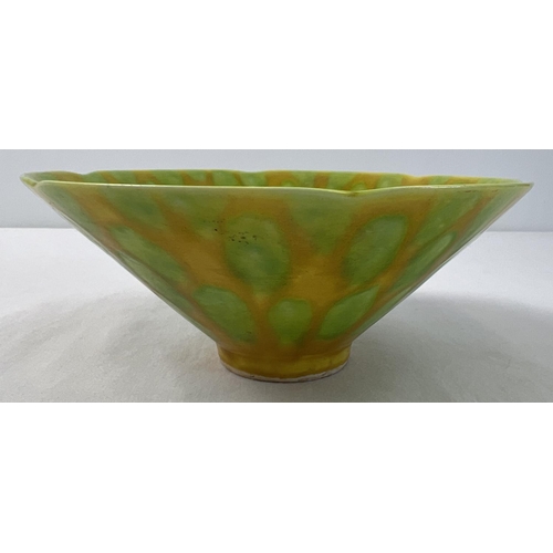 1317 - A Chinese ceramic bowl with yellow and green spotted design glaze and scalloped rim. Hand painted si... 