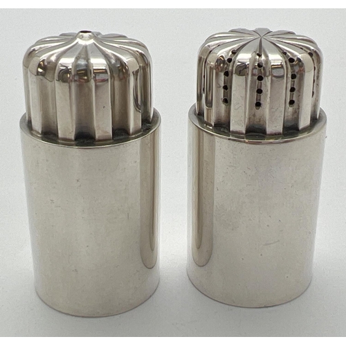 1166 - Georg Jensen silver salt and pepper designed by Sigvard Bernadotte, numbered design 834. Of cylindri... 