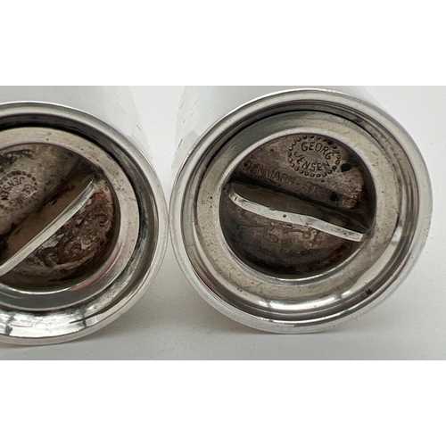 1166 - Georg Jensen silver salt and pepper designed by Sigvard Bernadotte, numbered design 834. Of cylindri... 