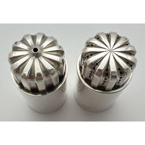 1166 - Georg Jensen silver salt and pepper designed by Sigvard Bernadotte, numbered design 834. Of cylindri... 