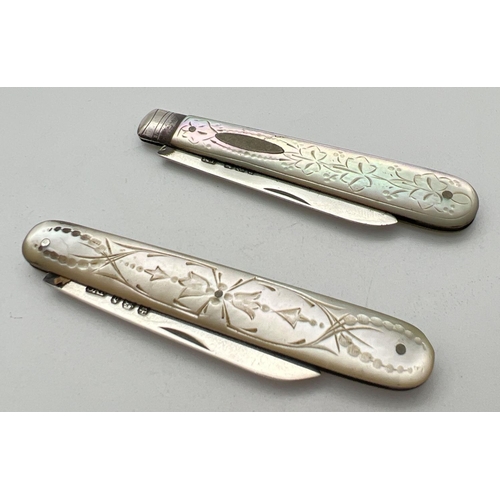 1175 - 2 Victorian silver bladed, mother of pearl handled fruit knives. Both with foliate design engraved d... 