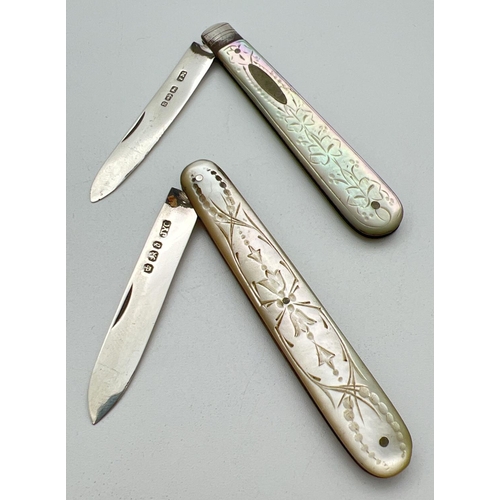 1175 - 2 Victorian silver bladed, mother of pearl handled fruit knives. Both with foliate design engraved d... 