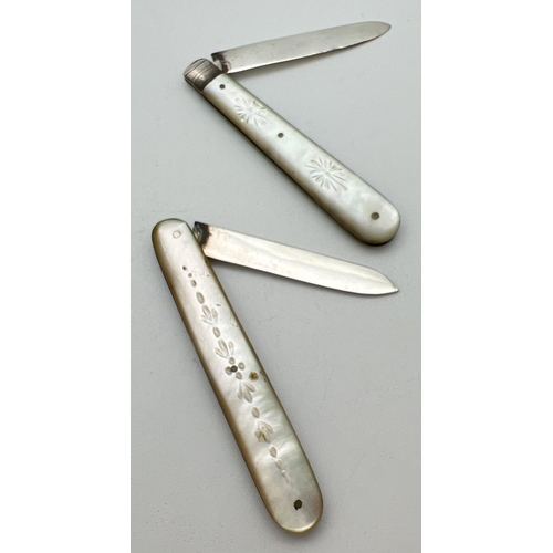 1175 - 2 Victorian silver bladed, mother of pearl handled fruit knives. Both with foliate design engraved d... 