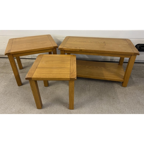 1501 - A modern light oak coffee table together with 2 matching side/lamp tables. Under shelf to coffee tab... 