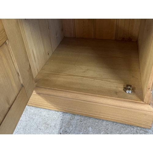 1503 - A pair of modern pine bedside cabinets with bun handles, single drawer and cupboard to each. Approx.... 