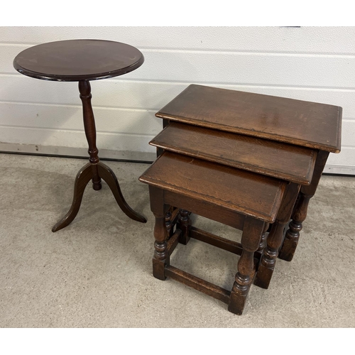 1505 - A vintage dark wood nest of tables with turned legs and carved decoration. Together with a small cir... 