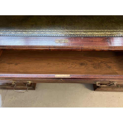 1514 - An Edwardian dark oak S bend roll top desk with 4 drawer twin pedestals. Interior has green leather ... 