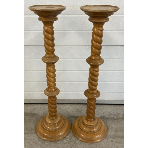 1525 - A pair of light wood jardiniere/plant stands with twist design pedestal stems. Each approx. 97cm tal... 