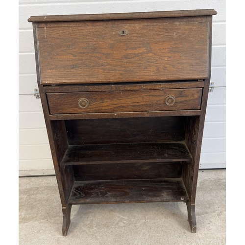 1526 - A vintage dark wood bureau with undershelf and drawer. Interior stationary compartments to top secti... 